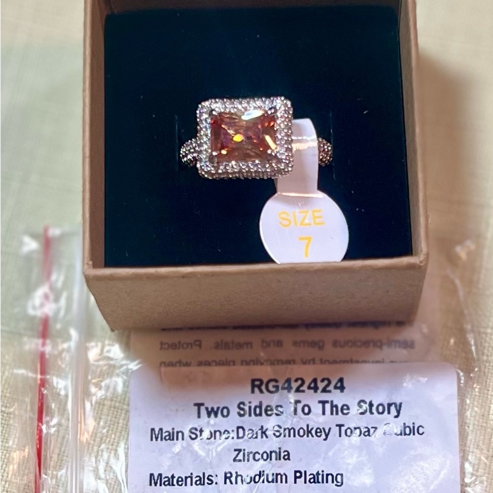 Elegant Silver Two Sides to The story Ring with Halo Design